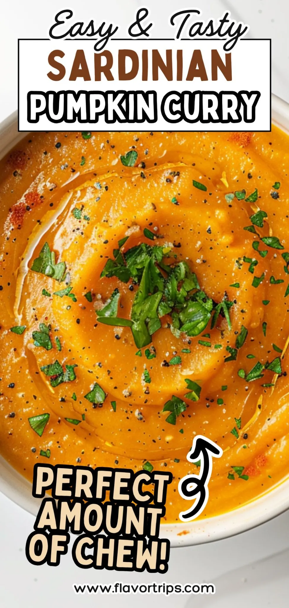 Creamy Sardinian pumpkin curry topped with fresh parsley and black pepper, styled in a white bowl on marble background