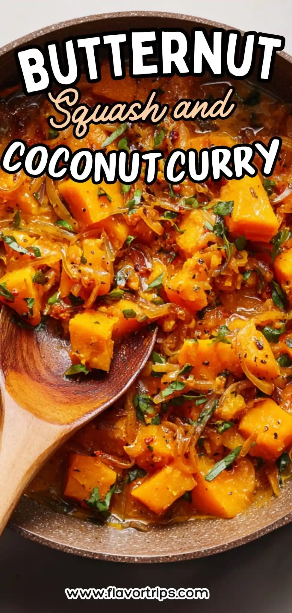 butternut squash coconut curry with onions and fresh herbs in a non-stick pan