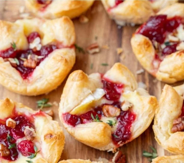Delicious Cranberry Brie Bites served on a platter for a festive appetizer.