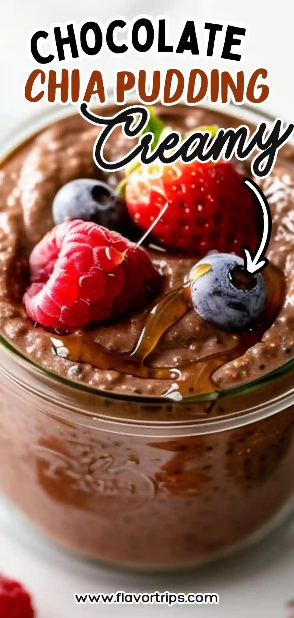 creamy chocolate chia pudding topped with raspberries, blueberries, strawberry and honey drizzle
