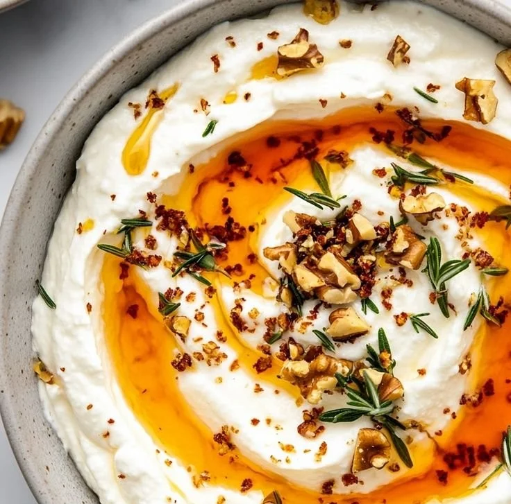 Delicious ricotta dip topped with hot honey served in a bowl