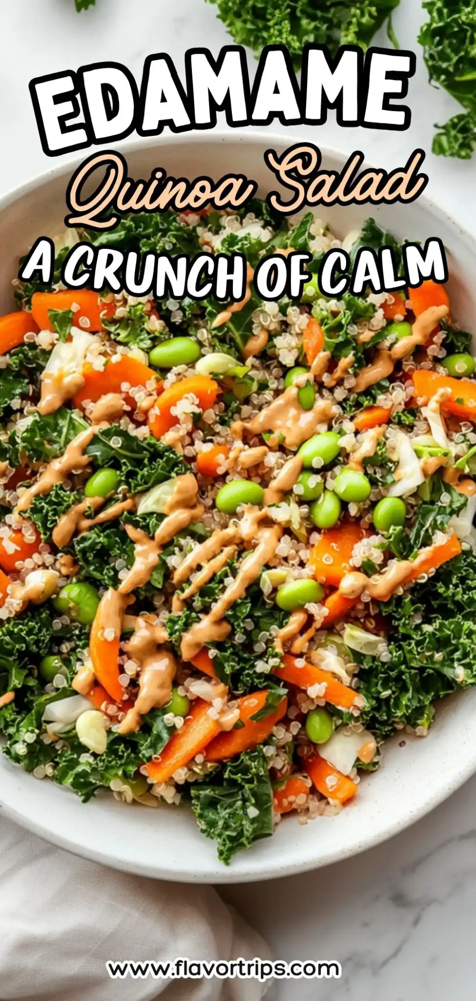 vibrant edamame quinoa salad with kale, carrots, and tahini dressing in a bowl