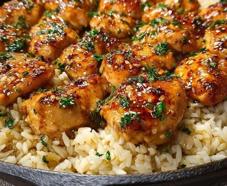 Honey Butter Garlic Chicken served over rice with a rich buttery garlic sauce.