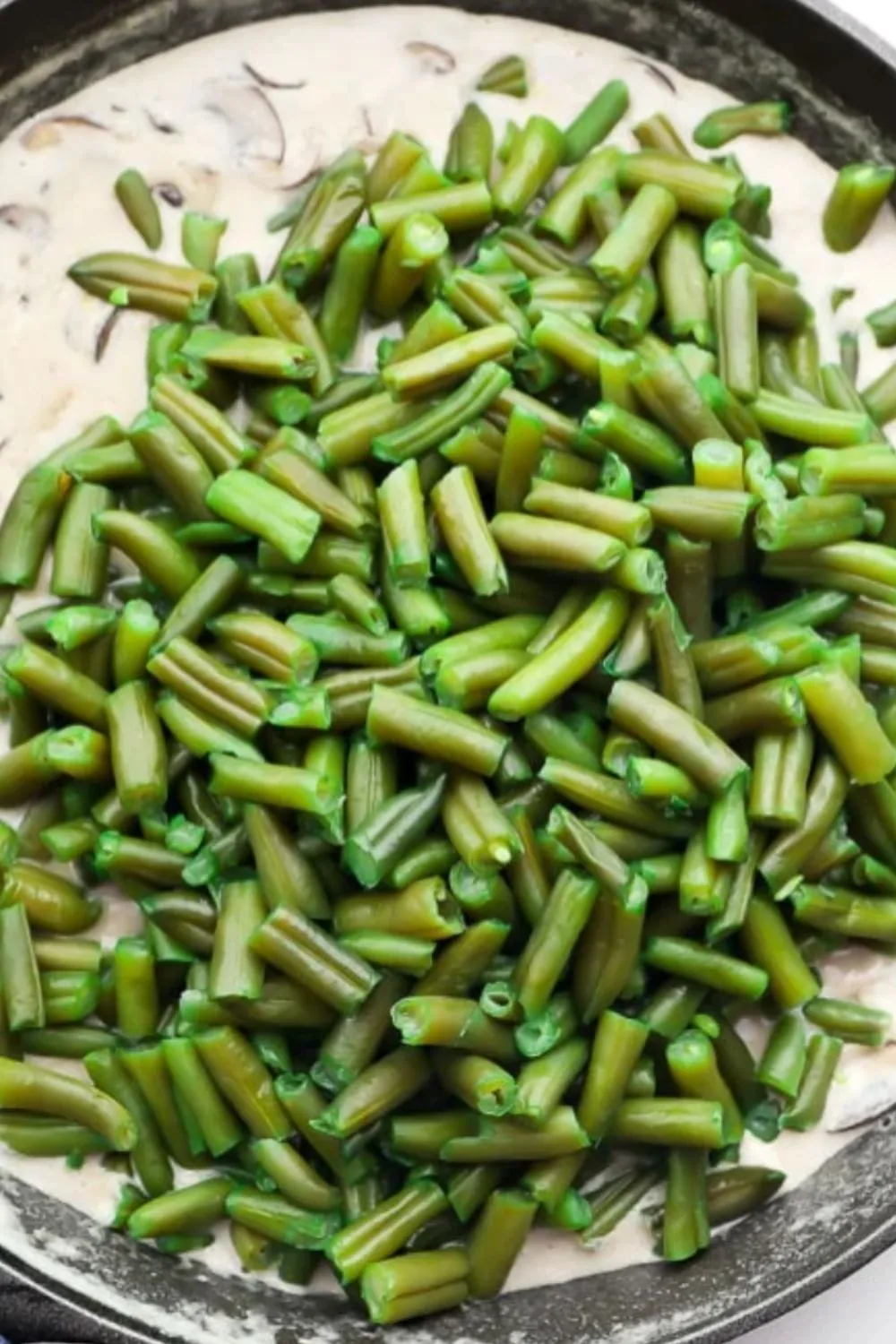 Blanched vegan green beans Casserole in creamy vegan mushroom sauce
