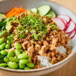 Delicious ground turkey rice bowls topped with bang bang sauce