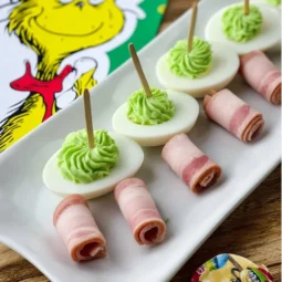 Colorful green eggs and ham party food inspired by Dr. Seuss.