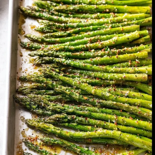 Delicious oven roasted asparagus served on a plate