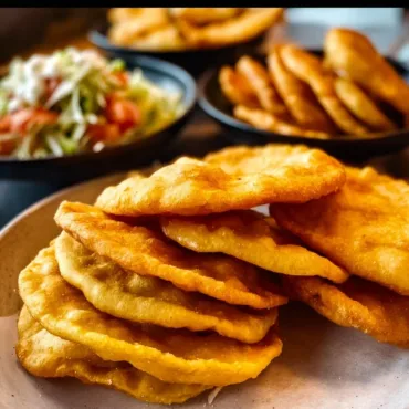 Homemade Taco Bell chalupas with fresh toppings on a plate