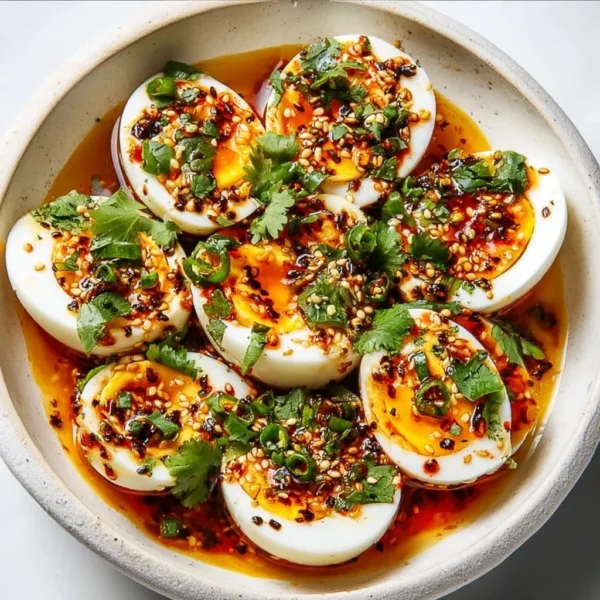 Spicy Chili Garlic Deviled Eggs 5 Spicy Chili Garlic Deviled Eggs served as a flavorful appetizer